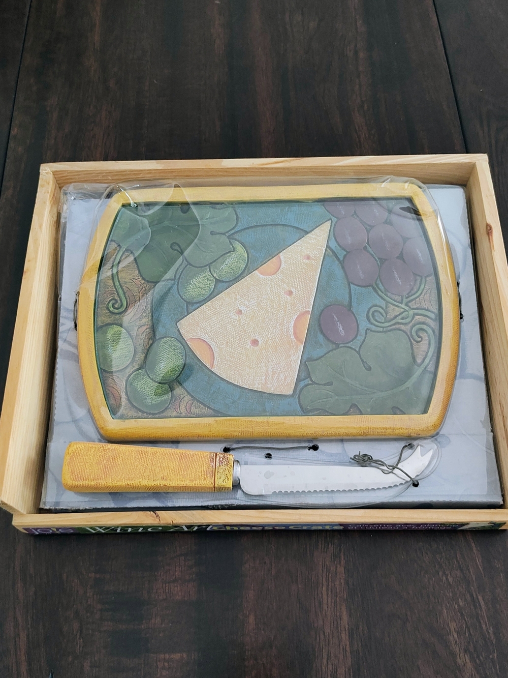 Yellow Handle Serrated Cheese Knife with Matching Decorative Cutting Board